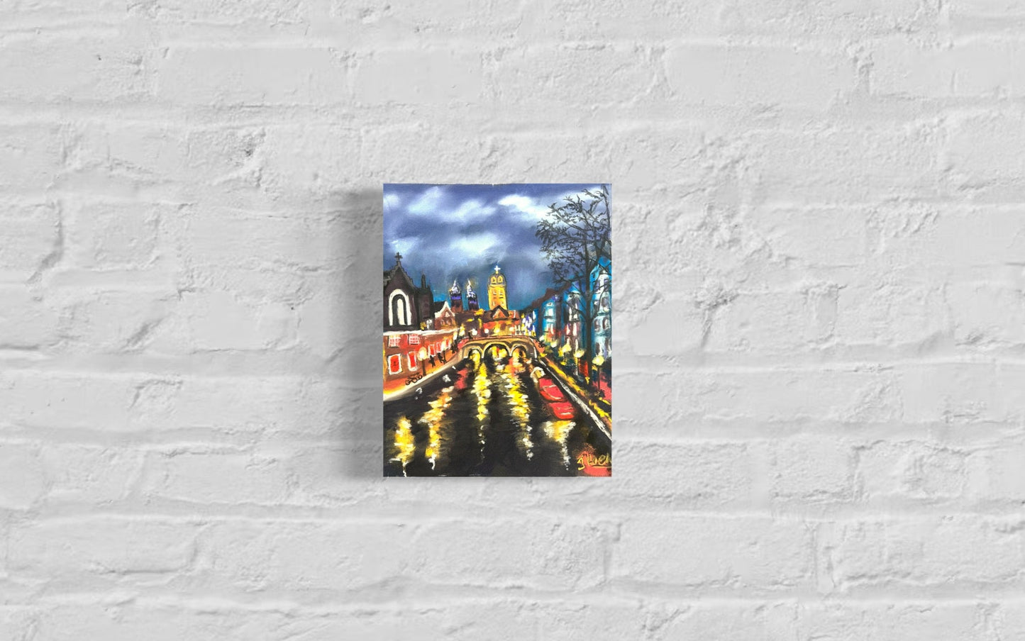 Painting of a city street in amsterdam at night on a textured white wall